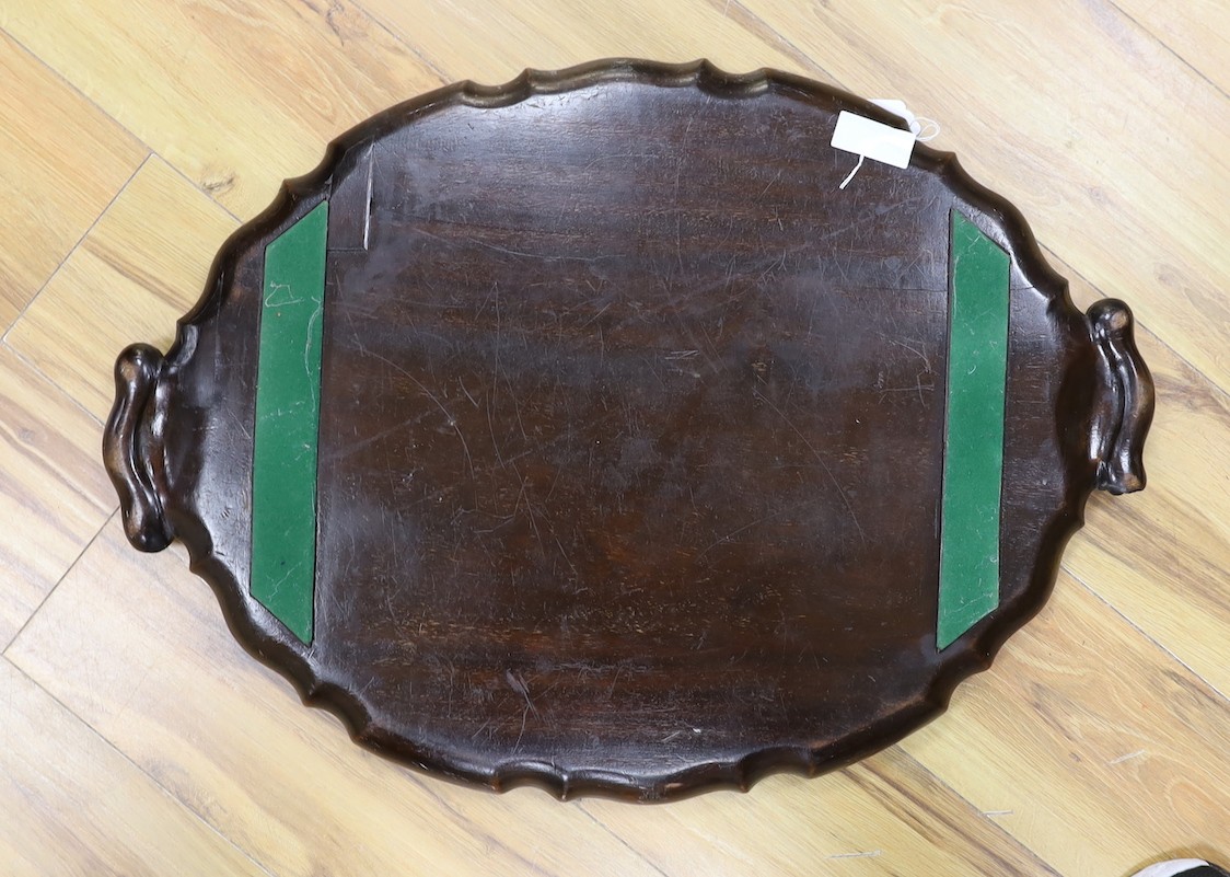 A 19th century carved oval mahogany tray, 67cm